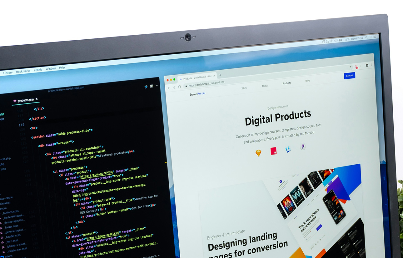 A laptop that displays a clean, modern website design with the text "Digital Products" and "Designing landing pages for conversion." This image represents professional WordPress web design and development services tailored for business growth.